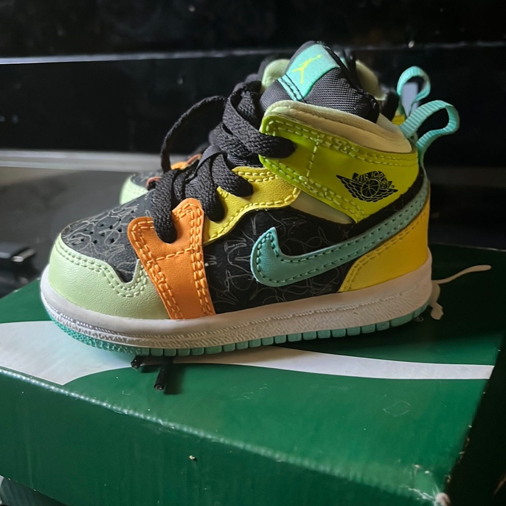 Black and neon colored Jordan’s worn literally for 10 minutes brand new.